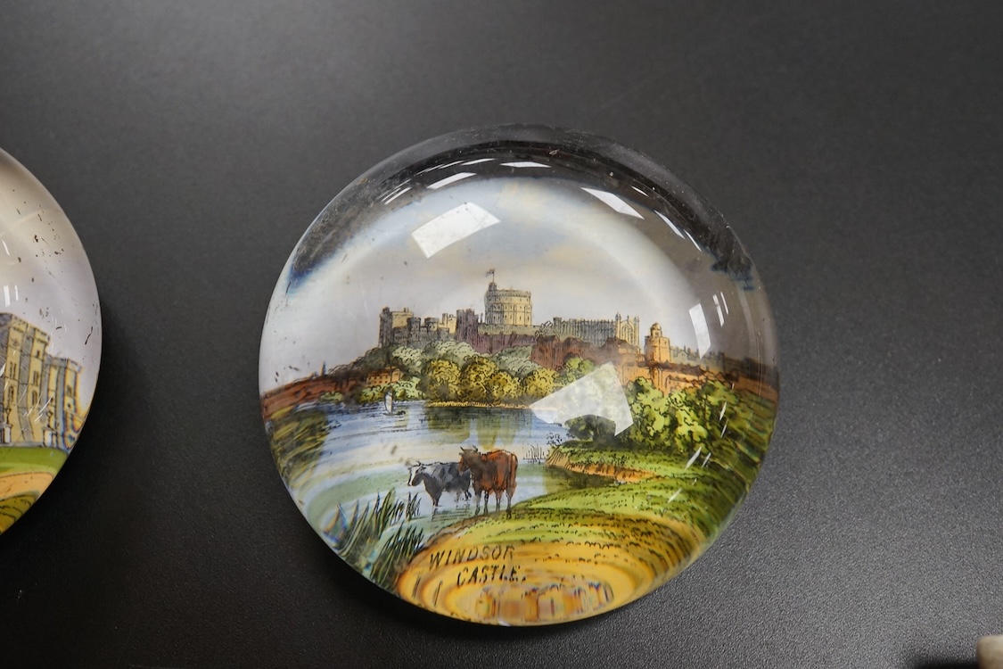Six pictorial glass gem paperweights and three 19th century scent bottles, largest 11cm in length